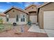 Charming home with a well-maintained front yard, complemented by a neatly kept two-car garage at 3723 Robin Knot Ct, North Las Vegas, NV 89084