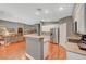 This open kitchen flows into the living area and features stainless steel appliances at 3723 Robin Knot Ct, North Las Vegas, NV 89084