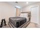 Cozy bedroom showcases a tufted headboard, carpeted floors and access to natural light at 397 American Dipper St, Las Vegas, NV 89138