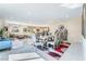 Open-concept room with dining area featuring elegant table set and view to living room at 397 American Dipper St, Las Vegas, NV 89138
