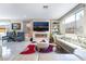 Cozy living room with modern fireplace, built-in shelves, and great natural light at 397 American Dipper St, Las Vegas, NV 89138