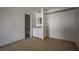 This bedroom with tile floor features a convenient vanity, mirror, and closet space at 4600 University Center Dr # 99, Las Vegas, NV 89119