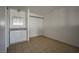 This bedroom with tile floor features a convenient vanity, mirror, and closet space at 4600 University Center Dr # 99, Las Vegas, NV 89119