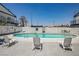 Relaxing pool area offers a tranquil escape with lounge chairs on the sundeck at 4600 University Center Dr # 99, Las Vegas, NV 89119