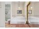 Bright bathroom features a large soaking tub and glass-enclosed shower at 519 N Racetrack Rd, Henderson, NV 89015