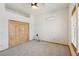Bedroom featuring carpet, ceiling fan, closet and air conditioning at 519 N Racetrack Rd, Henderson, NV 89015