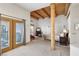 Bedroom featuring tall ceiling with wood and large windows at 519 N Racetrack Rd, Henderson, NV 89015