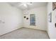Bedroom with carpet, closet, air conditioner, and natural light at 519 N Racetrack Rd, Henderson, NV 89015