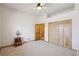 Spacious bedroom features carpet, ceiling fan, closet, and ample space at 519 N Racetrack Rd, Henderson, NV 89015