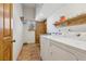 Laundry room featuring tile floors and sink at 519 N Racetrack Rd, Henderson, NV 89015