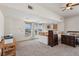Spacious loft with views from large windows and a half-wall separating the sleeping area at 519 N Racetrack Rd, Henderson, NV 89015
