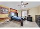 Bedroom with ceiling fan, window, and yellow walls at 5438 Cholla Cactus Ave, Las Vegas, NV 89141
