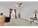 Bright bedroom with ceiling fan, window, and neutral decor at 5438 Cholla Cactus Ave, Las Vegas, NV 89141