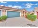 Charming single-story home with a well-manicured front yard and a two-car garage at 5438 Cholla Cactus Ave, Las Vegas, NV 89141