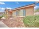 Close up view of the front of the house showing the window and landscaping at 5438 Cholla Cactus Ave, Las Vegas, NV 89141