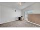 Bedroom features ceiling fan and a window overlooking neighborhood at 5537 Parlay Way # 101, Las Vegas, NV 89122