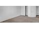 Unfurnished bedroom features neutral carpet, a large closet, and a second door at 5537 Parlay Way # 101, Las Vegas, NV 89122