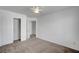 Neutral toned bedroom featuring closet and ensuite doorway at 5537 Parlay Way # 101, Las Vegas, NV 89122