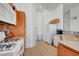 Functional kitchen featuring a gas range and bright countertops at 5537 Parlay Way # 101, Las Vegas, NV 89122