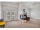 Bright living room featuring a fireplace and tall ceilings at 5537 Parlay Way # 101, Las Vegas, NV 89122