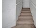 Carpeted staircase leading to the upper level at 5537 Parlay Way # 101, Las Vegas, NV 89122