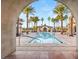 Community pool and spa with palm trees at 5809 Sagamore Canyon St, North Las Vegas, NV 89081