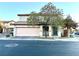 Charming two-story home with a two-car garage and desert landscaping at 6087 Devers Ct, Las Vegas, NV 89118