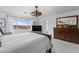 Bright bedroom with neutral carpet, large bed, and contemporary decor at 6346 Rock Strm Ln, Las Vegas, NV 89141