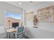 Modern office space with a desk, computer, and a view of the mountains at 6346 Rock Strm Ln, Las Vegas, NV 89141