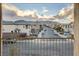Balcony view showcasing a quiet street and the distant mountains, providing a tranquil outdoor retreat at 6828 Sumatra St, Las Vegas, NV 89166