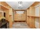 Custom walk-in closet with built-in shelving and drawers, providing ample storage and organization at 6828 Sumatra St, Las Vegas, NV 89166