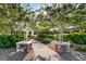 Scenic view of a lush park with a charming archway, enhancing the community's appeal at 6828 Sumatra St, Las Vegas, NV 89166