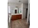 Bathroom featuring double vanity sinks, tile flooring, and separate tub at 684 Calamus Palm Pl, Henderson, NV 89011