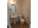 Half bathroom featuring a pedestal sink and neutral walls at 684 Calamus Palm Pl, Henderson, NV 89011