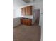 Loft area with built-in cabinets and carpeted floors at 684 Calamus Palm Pl, Henderson, NV 89011