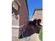 View of side yard between two homes, with gravel and rock landscaping at 684 Calamus Palm Pl, Henderson, NV 89011