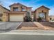 Charming two-story home featuring a tile roof, two-car garage, and low maintenance desert landscaping at 6913 Mill Creek Way, Las Vegas, NV 89149