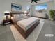 Staged primary bedroom featuring a large bed, neutral tones, ample natural light, and modern décor at 6913 Mill Creek Way, Las Vegas, NV 89149