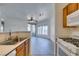 Efficient kitchen layout connecting to a bright living area with modern appliances at 7151 S Durango Dr # 211, Las Vegas, NV 89113