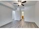 Clean bedroom features wood-look floors and neutral decor at 7163 S Durango Dr # 302, Las Vegas, NV 89113