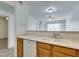 Open-concept kitchen with a sink and a view to the living room at 7163 S Durango Dr # 302, Las Vegas, NV 89113