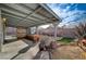 Outdoor patio with covered seating area, and a well-maintained yard at 806 Fireweed Dr, Henderson, NV 89002