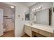Bathroom featuring an expansive vanity and mirror, and tile flooring at 806 Fireweed Dr, Henderson, NV 89002