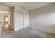 This bedroom boasts neutral carpet, double closet, and natural light at 806 Fireweed Dr, Henderson, NV 89002