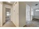 Inviting entryway with tile flooring and a view into the living area and a bedroom at 806 Fireweed Dr, Henderson, NV 89002