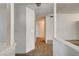 Bright hallway with tile flooring and a view into adjacent rooms at 806 Fireweed Dr, Henderson, NV 89002