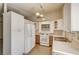 Updated kitchen with stainless steel sink and modern appliances at 806 Fireweed Dr, Henderson, NV 89002