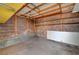An empty storage shed featuring exposed brick walls and shelving, ready for storage or customization at 806 Fireweed Dr, Henderson, NV 89002