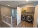 Convenient upstairs laundry area with modern washer and dryer at 8105 Switchback Run St, Las Vegas, NV 89166