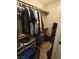 Organized walk-in closet with ample hanging space and storage shelves for clothing and personal items at 8105 Switchback Run St, Las Vegas, NV 89166